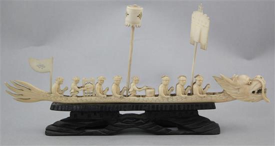 A Chinese ivory model of a dragon boat and four Indian ivory figures of ladies, early 20th century, 10.5cm. - 28cm.